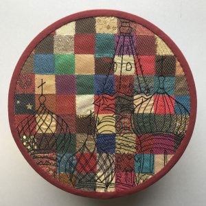Embroidered patchwork quilt design