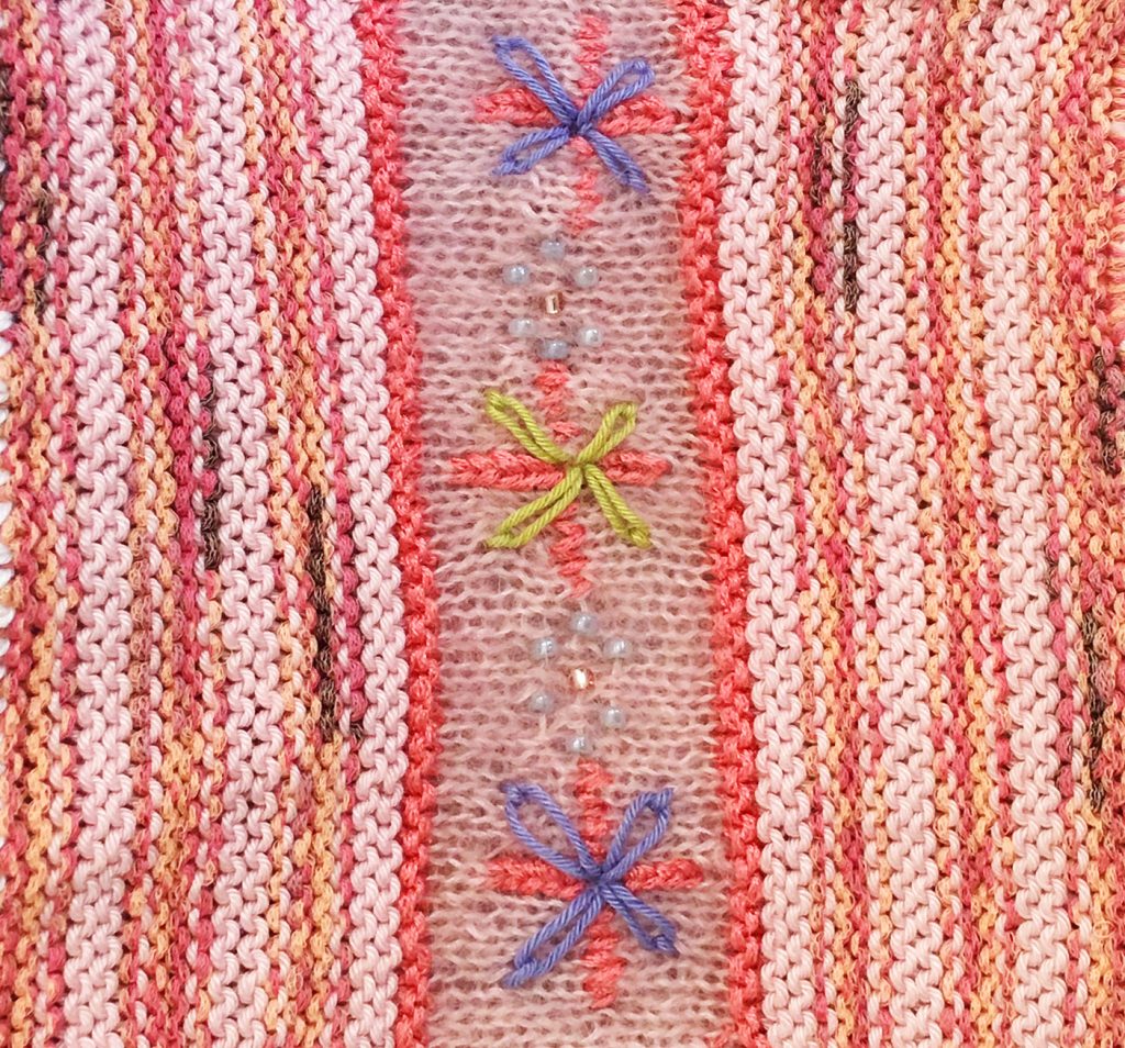 Close up of knitted blanket patchwork design by Sally Hart