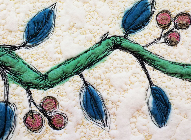 Felt creation of a green stem with blue leaves and red berries, all outlined in black
