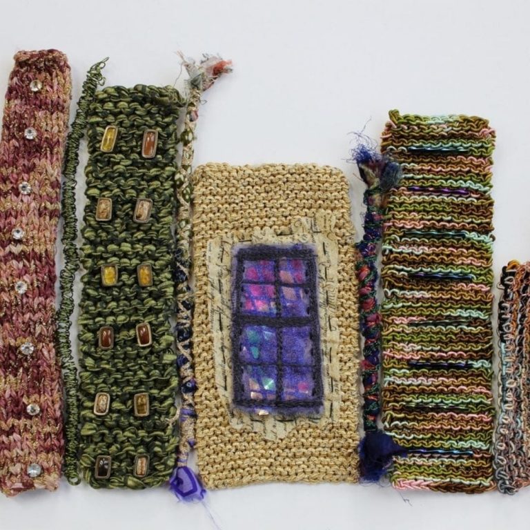 Knitted houses using different styles of knitting