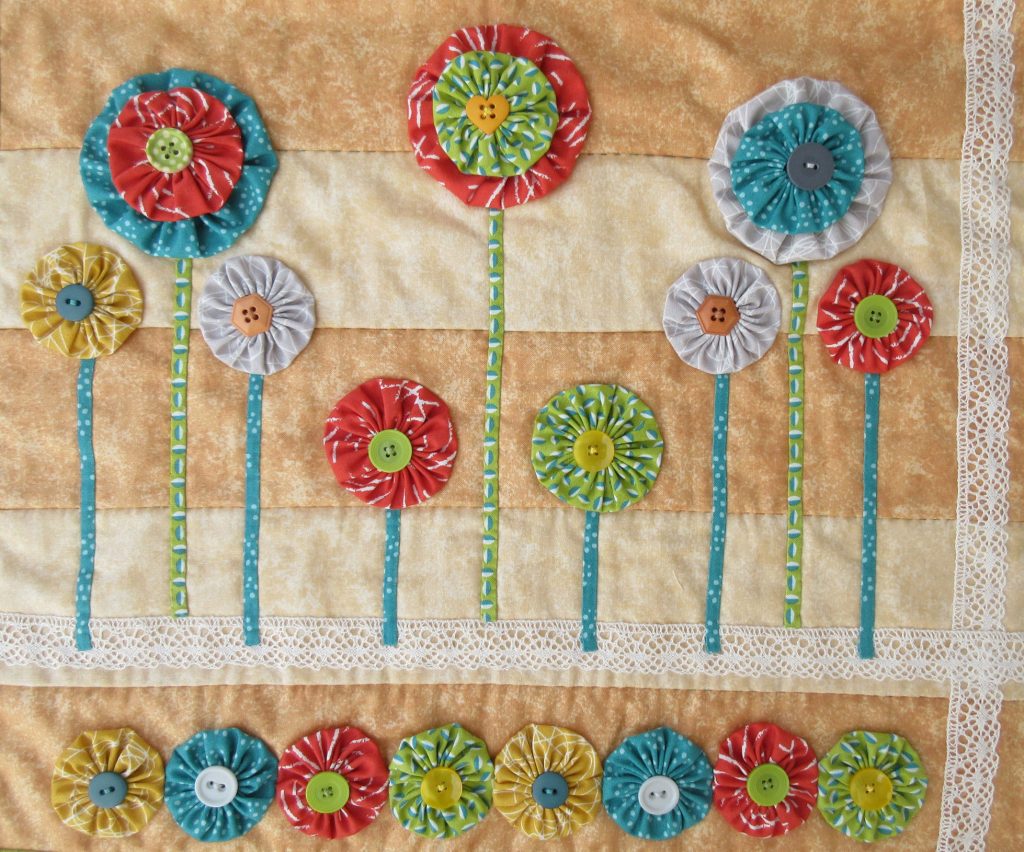 Patchwork and Quilting design with Suffolk Puffs