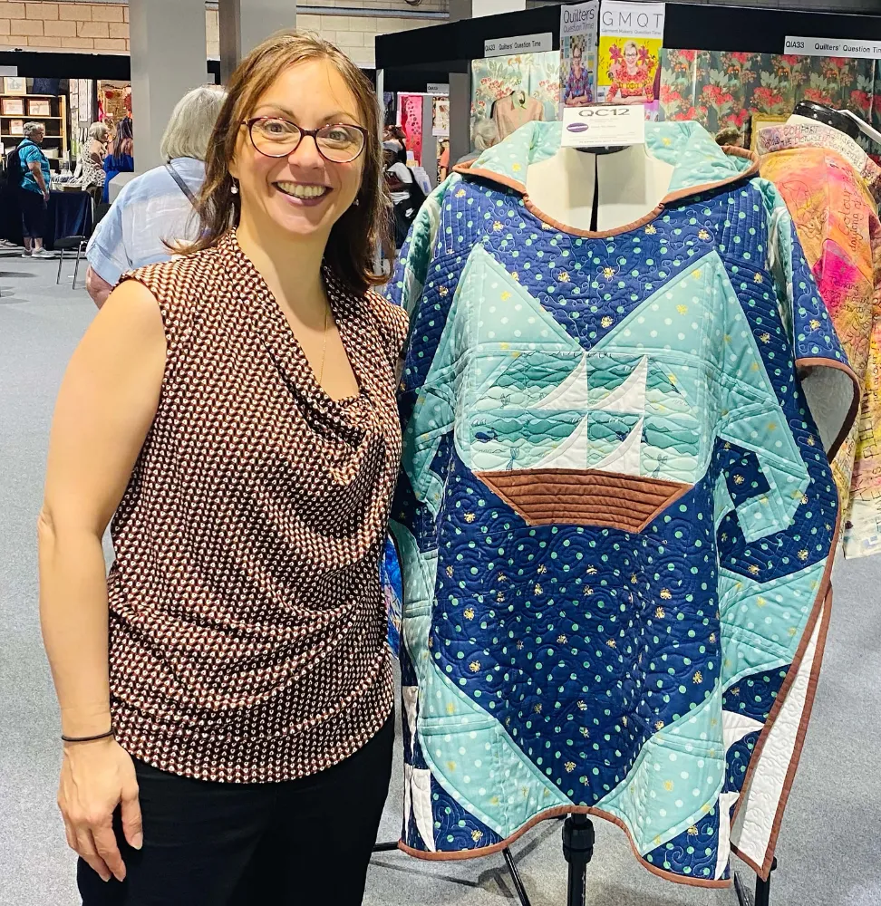 Exhibiting her shortlisted poncho at the festival of quilts Guiseppina Aleo, Patchwork and Quilting Graduate