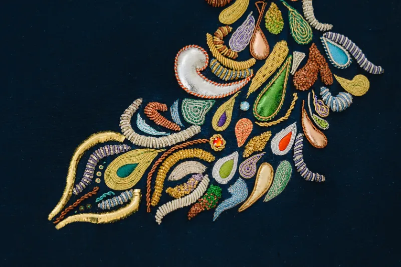 Crewel Work peacock embroidered by Chloe Savage