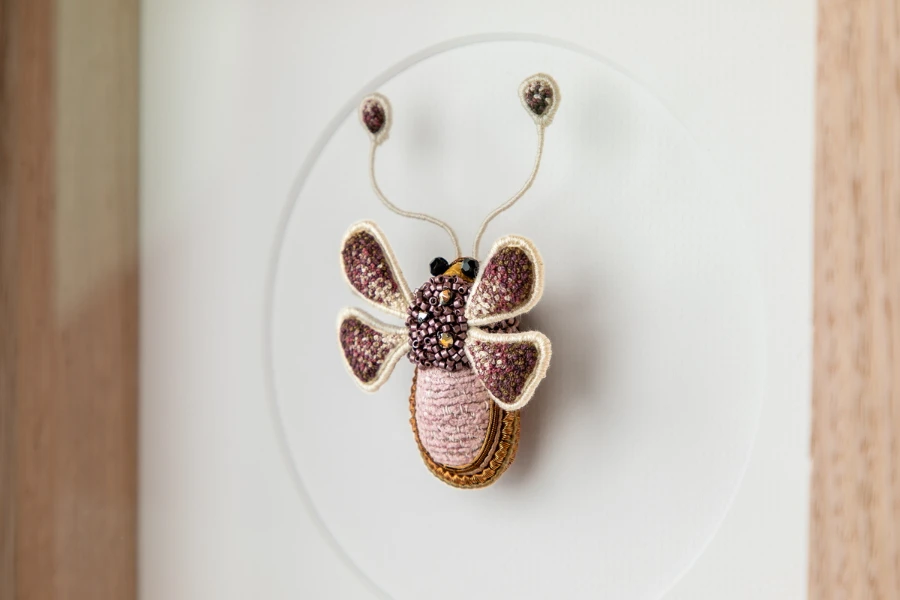 Embroidered insect by Embroidery artists Rachel Gooden.