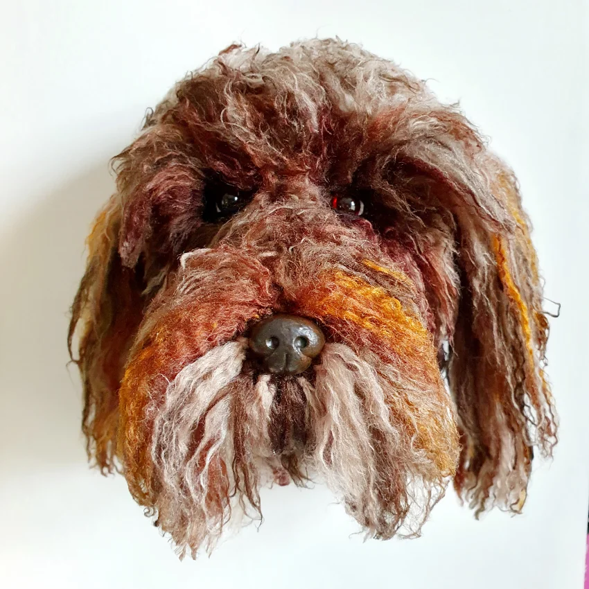 Crocheted dog head created by Judy Sendrove