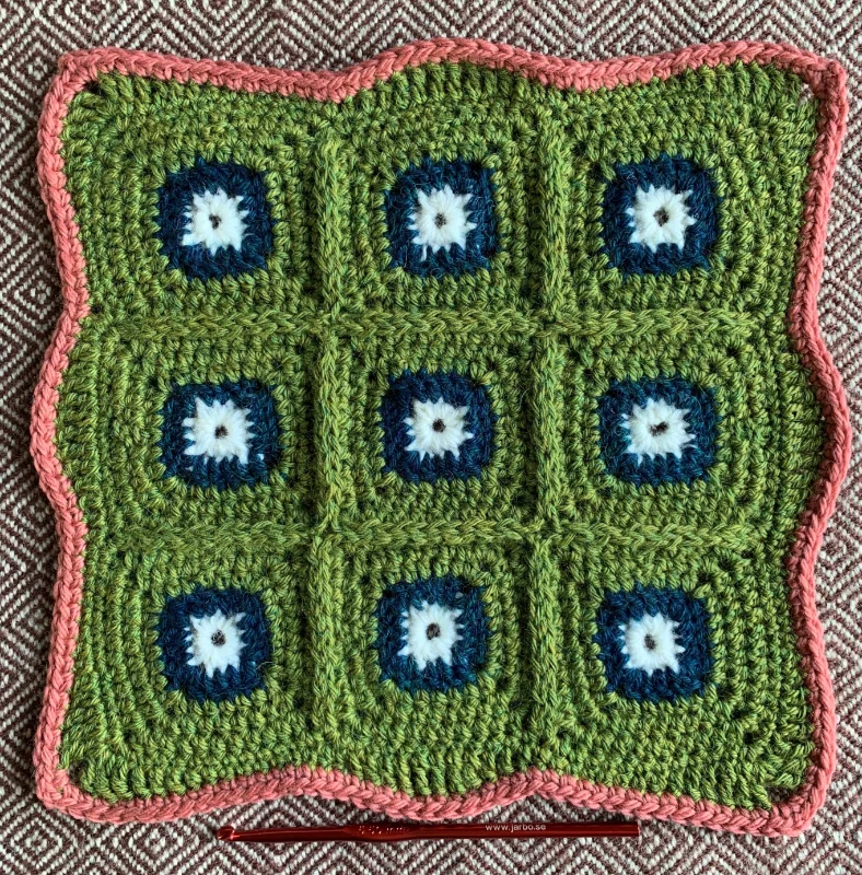 Experimental crocheted granny squares crocheted by Asa Brama and featured in the Student Excellence Awards