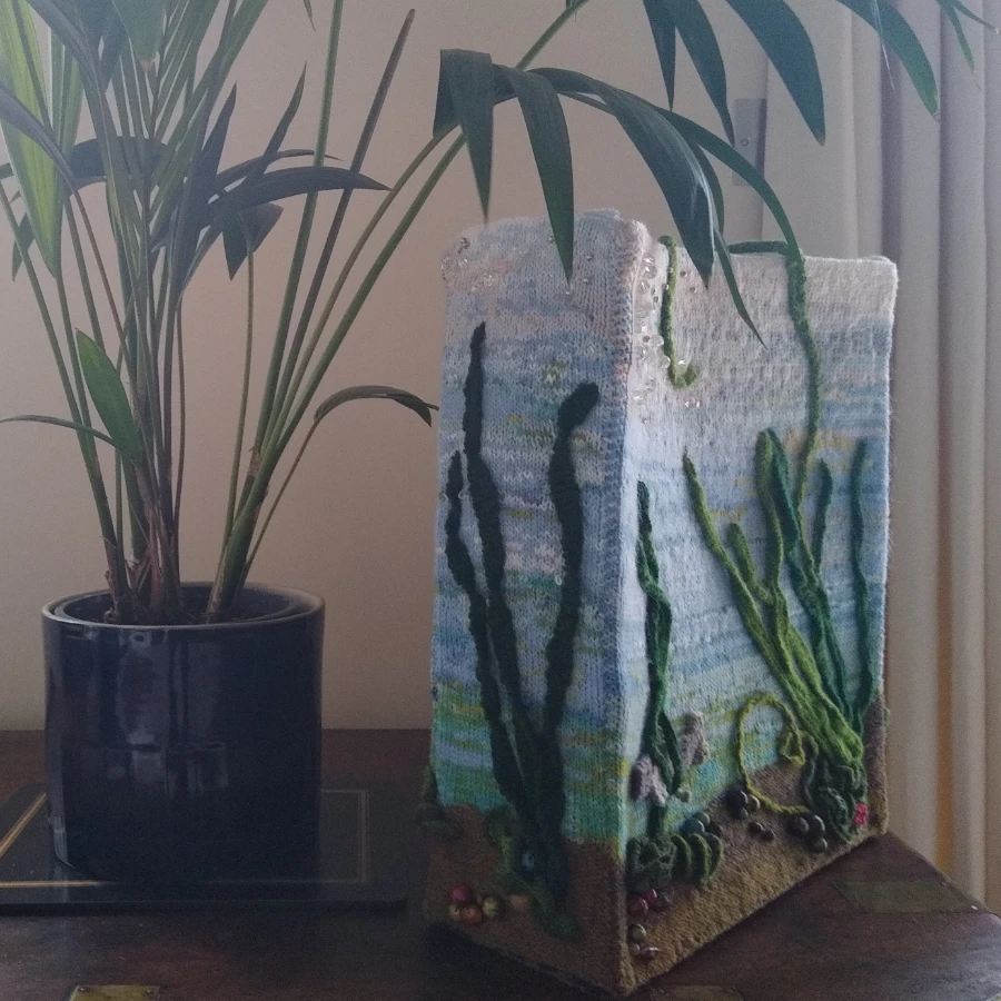 An ocean inspired knitted bag by Diana Feroze
