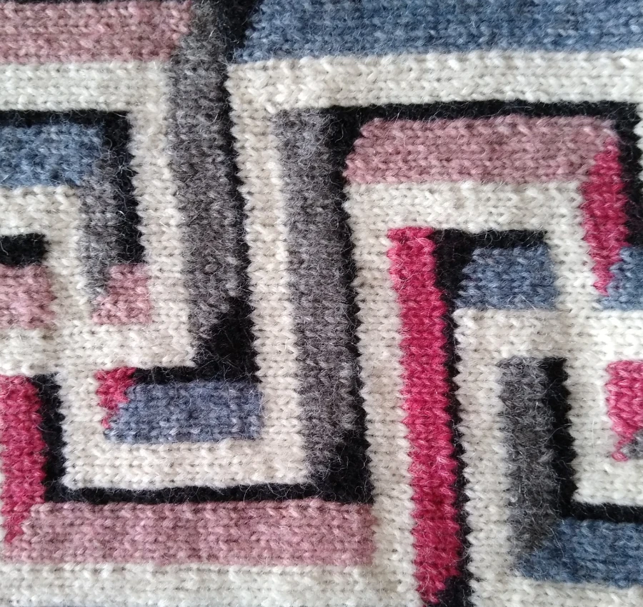 Close up detail of knitted blanket after developing a designer's eye