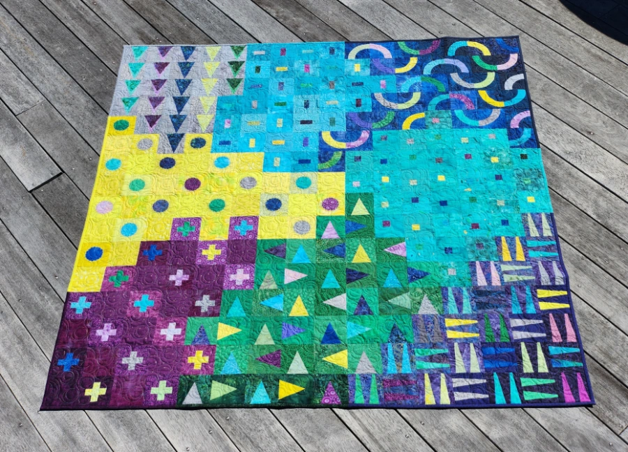 Original, vibrant patchwork quilt design by Lyn White