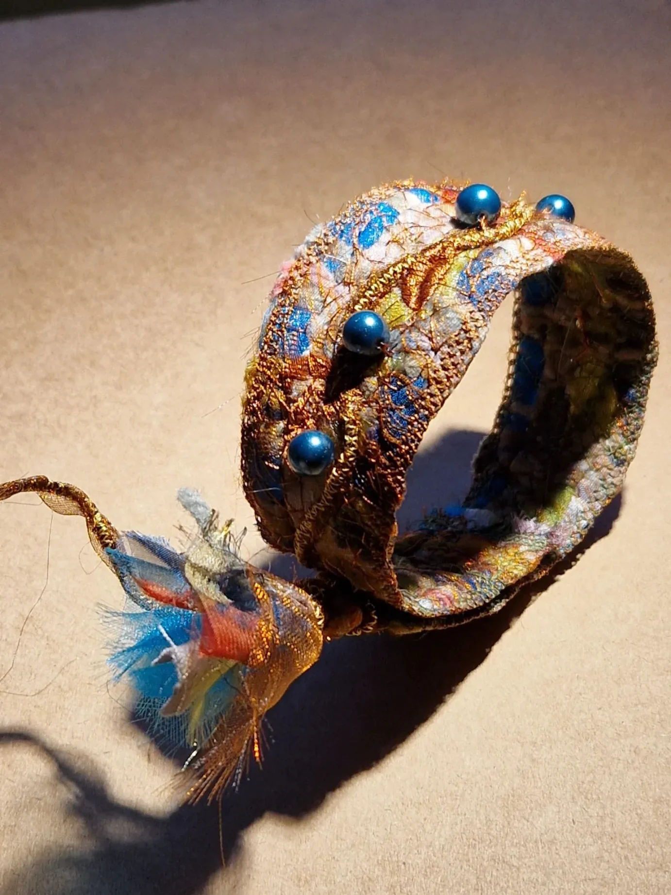 Machine Embroidery braclet by Susanna de Beer