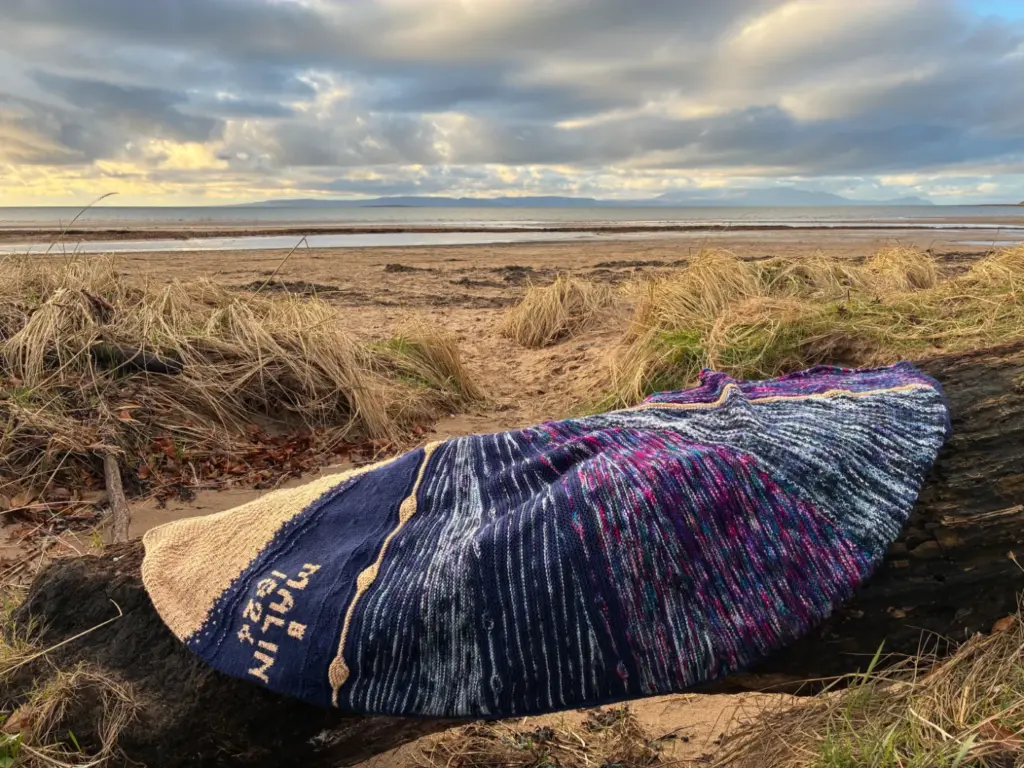 A gorgeous knitting design laid out n the beath, hand knitting, by SST Skill Stage 3 graduate Rhona Arthur