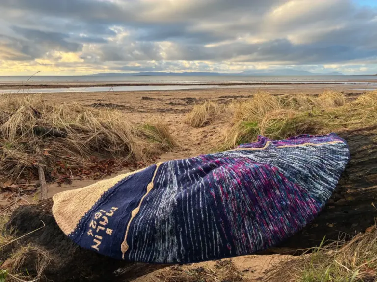 A gorgeous knitting design laid out n the beath, hand knitting, by SST Skill Stage 3 graduate Rhona Arthur