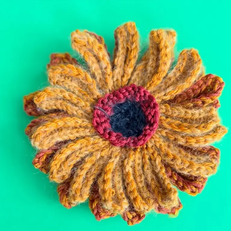 Knitted flower course work by Cilla, advanced knitting student